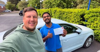 Learner driver confidently steering an automatic transmission car during a lesson in Tallaght