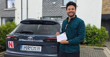 Certified instructor teaching mandatory 12 EDT driving lessons to a learner in Tallaght