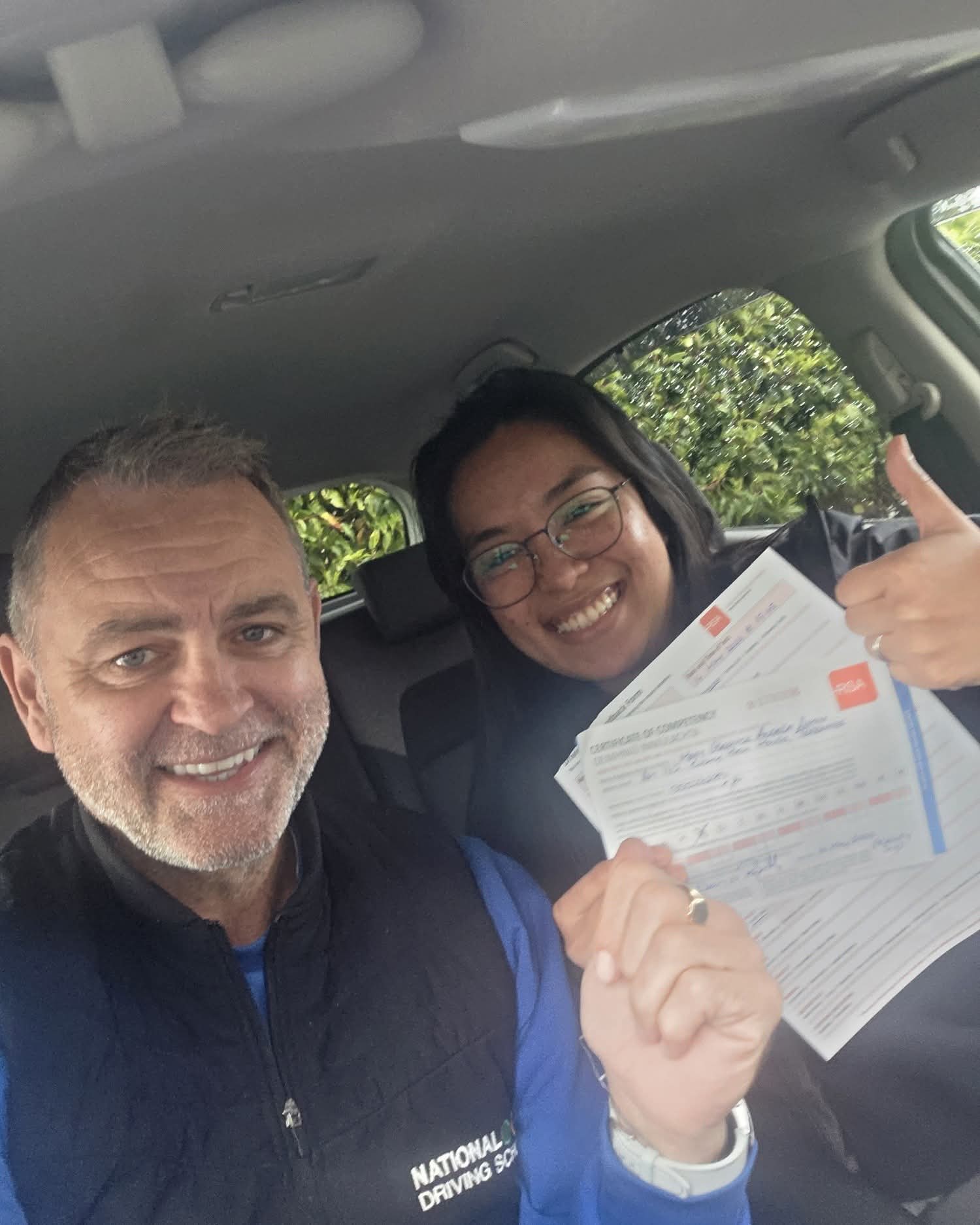 A certified driving instructor in Tallaght providing tailored, step-by-step driving lessons to a beginner in a dual-control car.