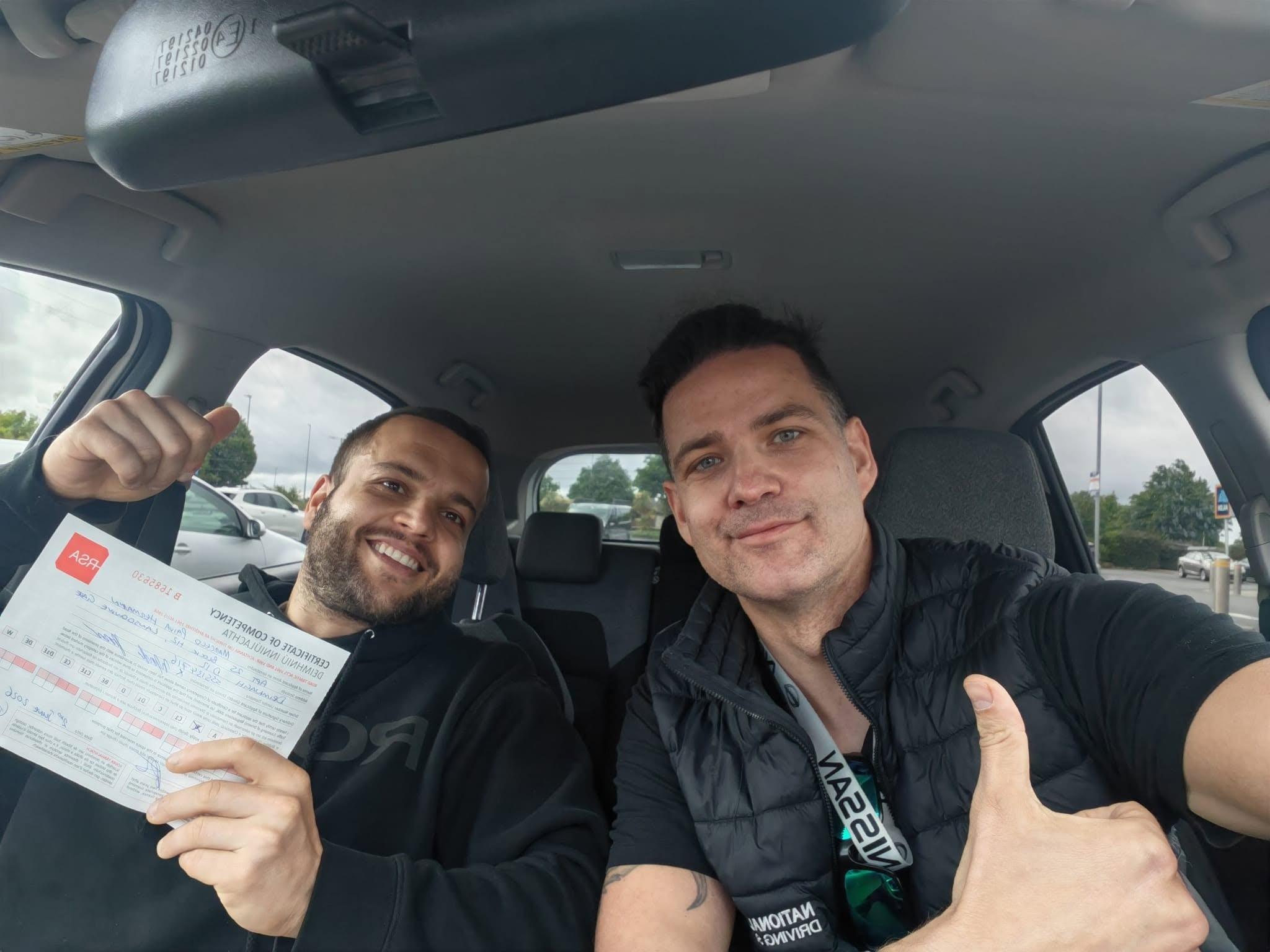 A certified ADI driving instructor in Tallaght demonstrating vehicle safety features to a learner driver in a modern, fully insured training car.